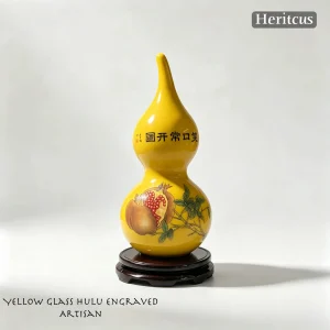 Carved chicken-fat yellow glass gourd with Chinese calligraphy Always Smile, symbol of happiness and positive energy, by Heritage & Craft.