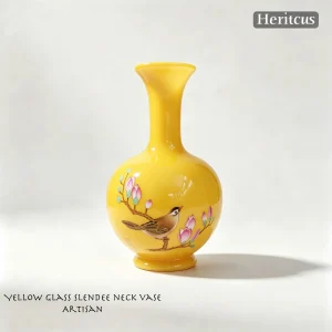 Carved chicken-fat yellow glass slender-neck vase with flower and bird motif, symbol of good fortune and harmony in Chinese tradition, by Heritage & Craft.