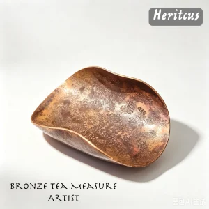 Hammered copper leaf-shaped tea scoop, handcrafted Gongfu tea accessory with textured surface and oxidized patina, by Heritage & Craft.