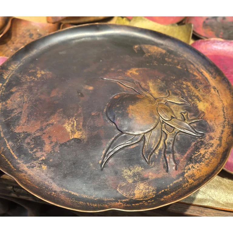 Hand-hammered oxidized copper Hu Cheng with engraved persimmon motif, symbol of good fortune, carved surface and patina,