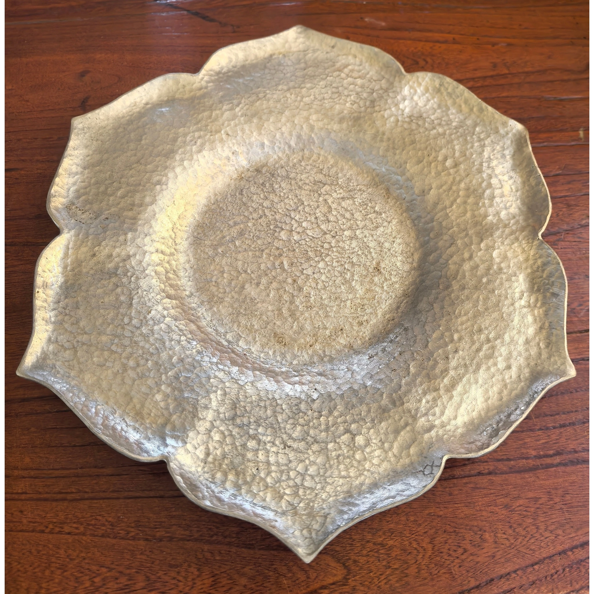 Hammered tin petal-shaped teapot stand original full view, showing flower-like contour and hand-hammered texture,