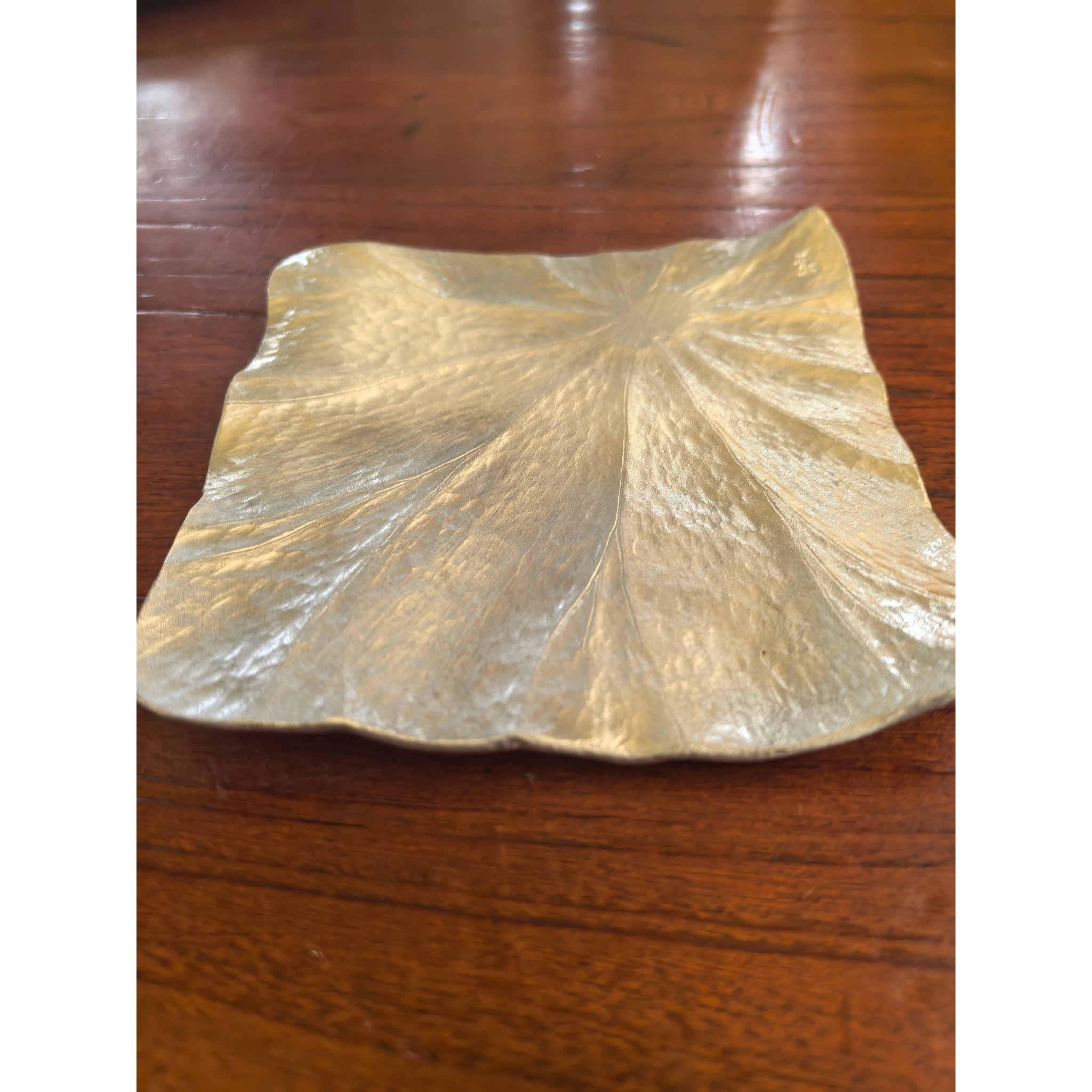 Hammered tin square leaf-shaped tea scoop original full view, showing hand-hammered texture and metallic finish,
