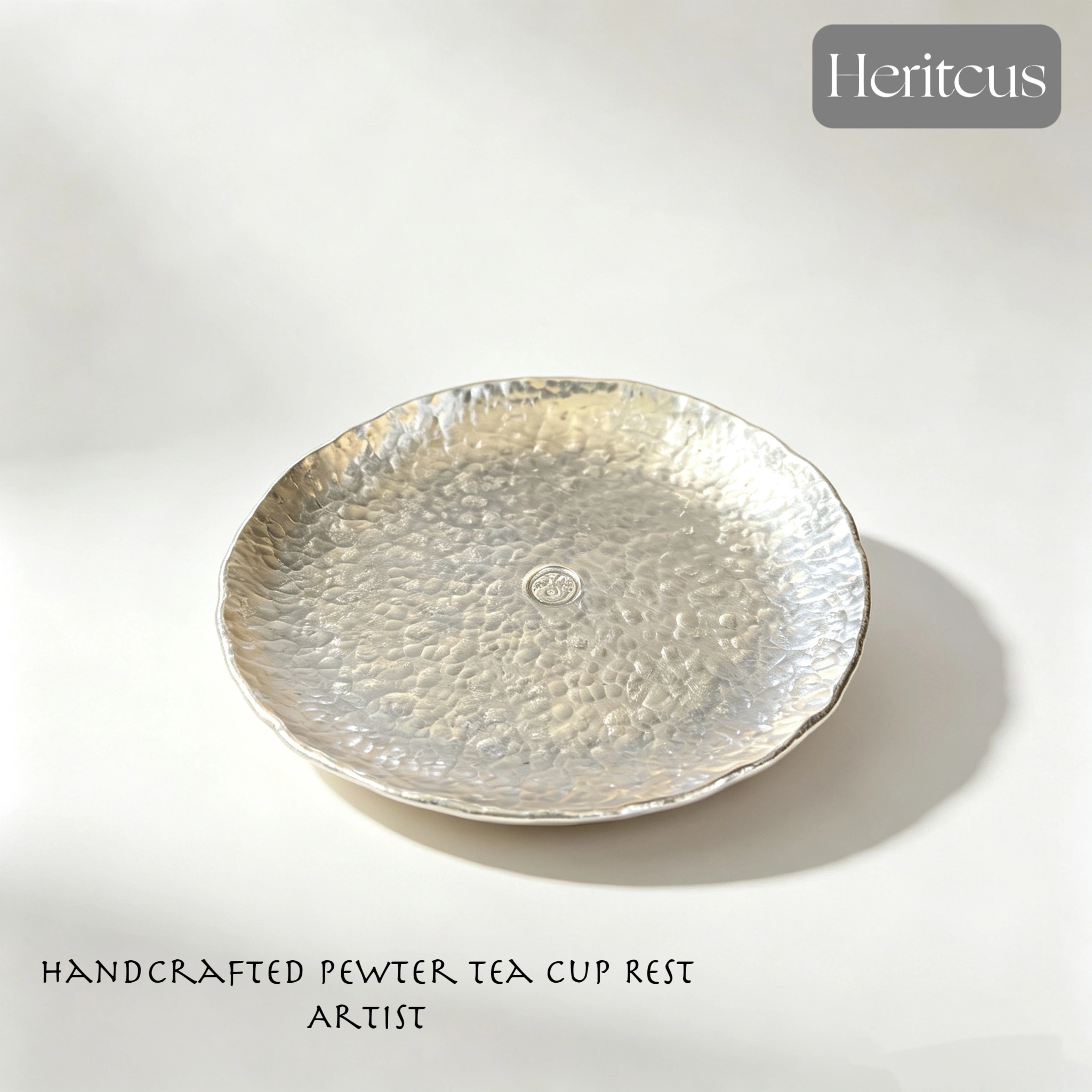 Hammered tin teacup saucer with handcrafted textured surface, traditional Chinese tea accessory, by Heritage & Craft.