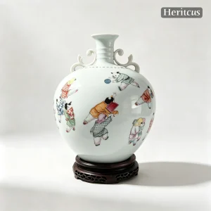 Master-level hand-carved porcelain bellied vase with children at play scene, overall view of engraved design, by Heritage & Craft.
