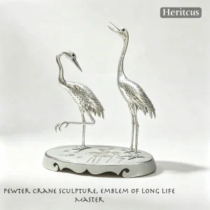 Handcrafted tin crane figurine sculpture, symbol of longevity and elegance in Chinese tradition, by Heritage & Craft.