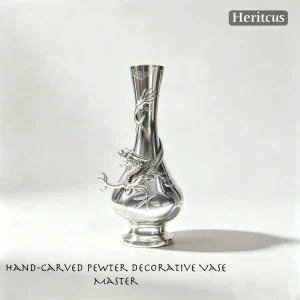 Hand-engraved tin vase with three-dimensional dragon relief sculpture, traditional Chinese metal craft, by Heritage & Craft.